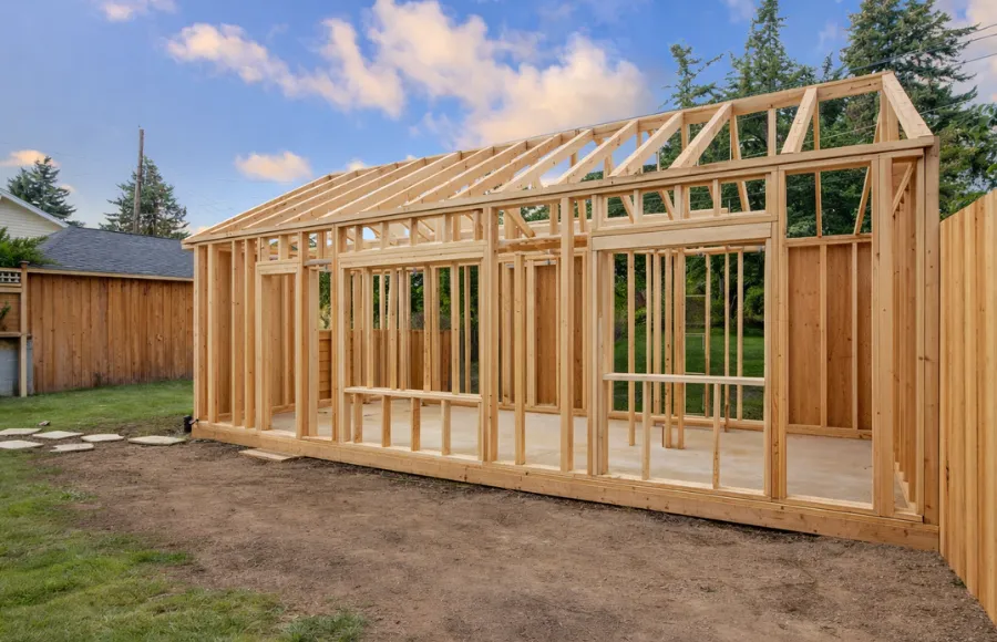 ADU framing services in Dallas, Texas showing the wood frame structure of a backyard cottage
