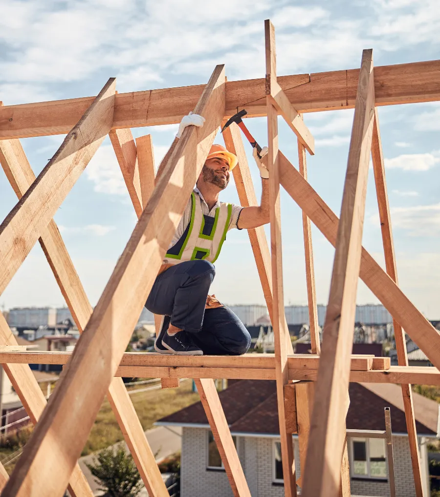 Roof framing contractor working on truss installation in Dallas Texas