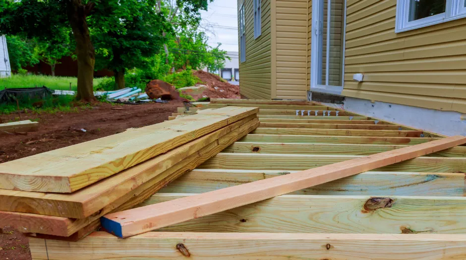 Residential porch framing project in Dallas with wood posts and roof support framing